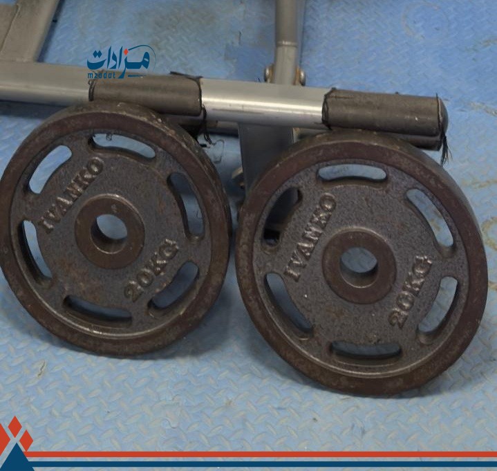 9- Squat Machine + Weight Plates (34) + Weight Stand (3)